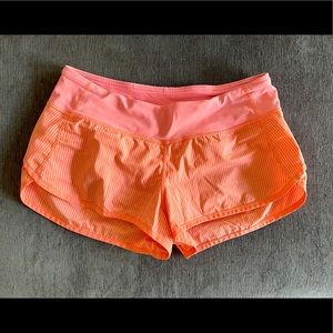Speed shorts.  Size 6.  Bright seersucker orange